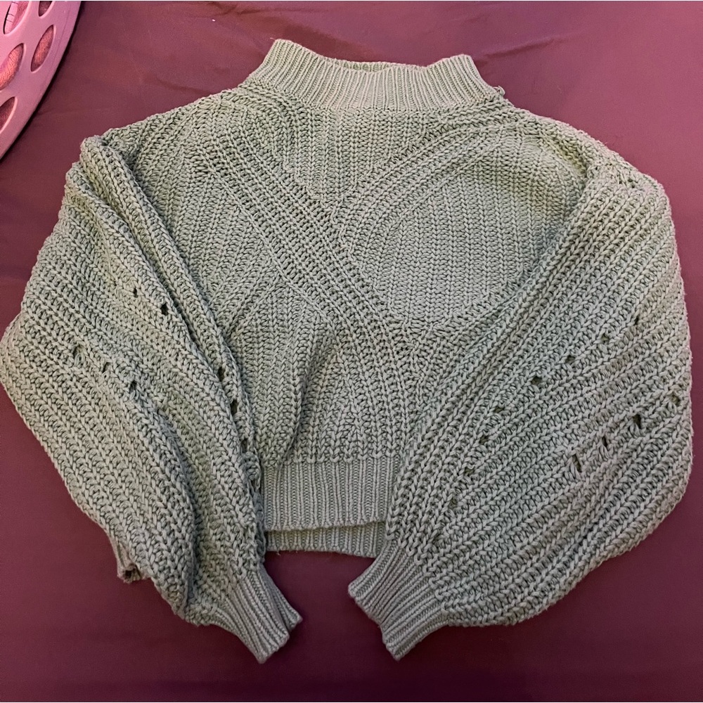 Green gripped sweater